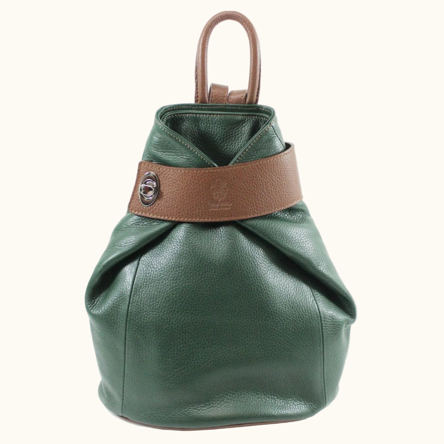 Green leather backpack with brown strap on a white background