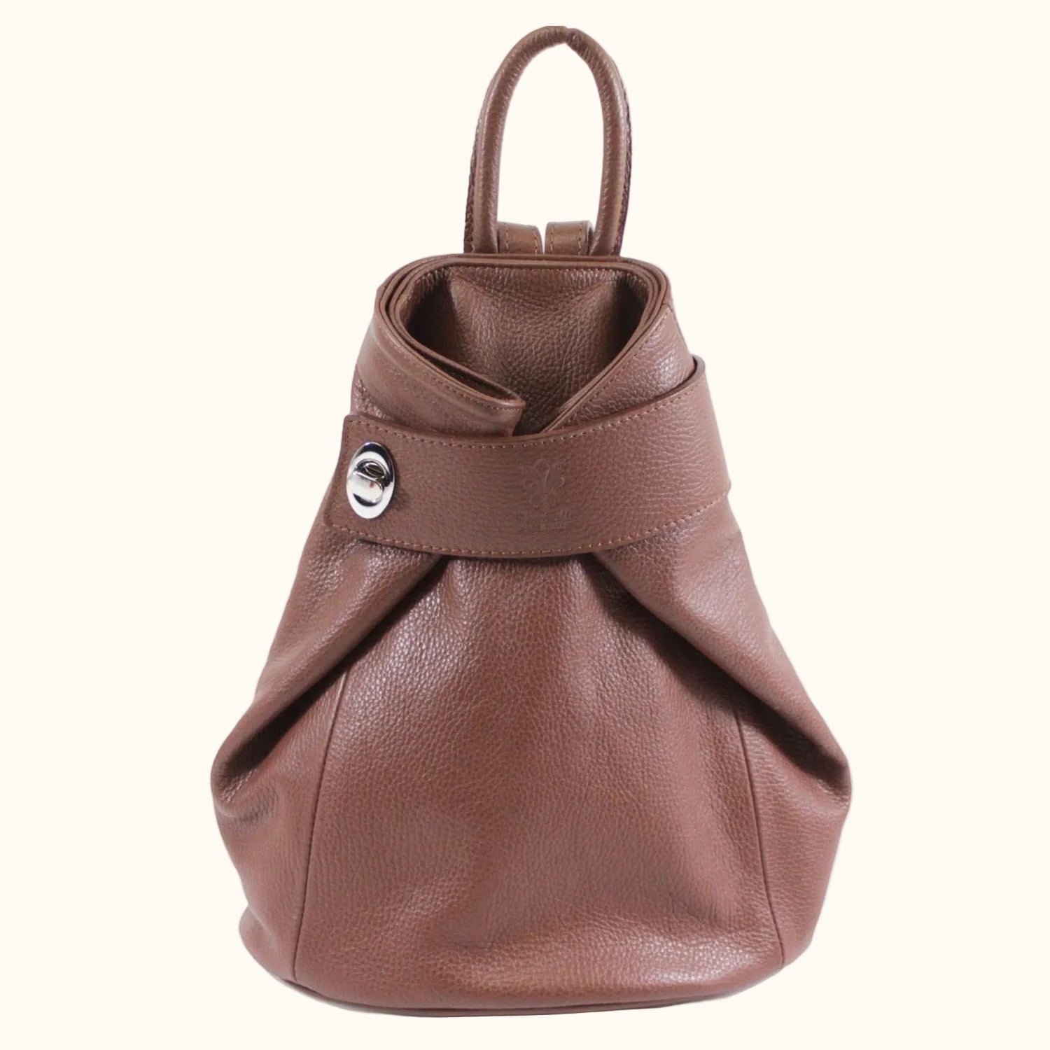 Brown leather backpack on a white background