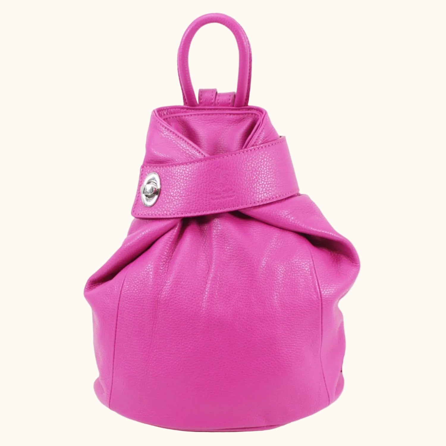 Pink leather drawstring bag on a white background