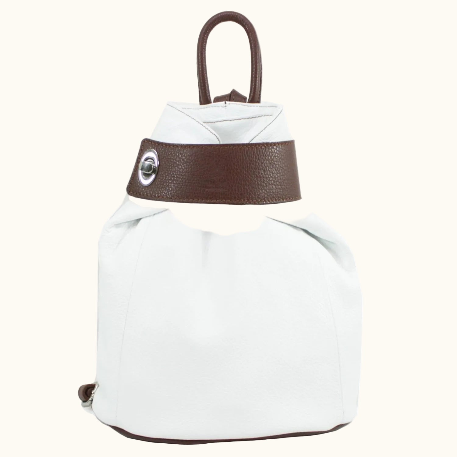 White backpack with brown leather accents on a white background