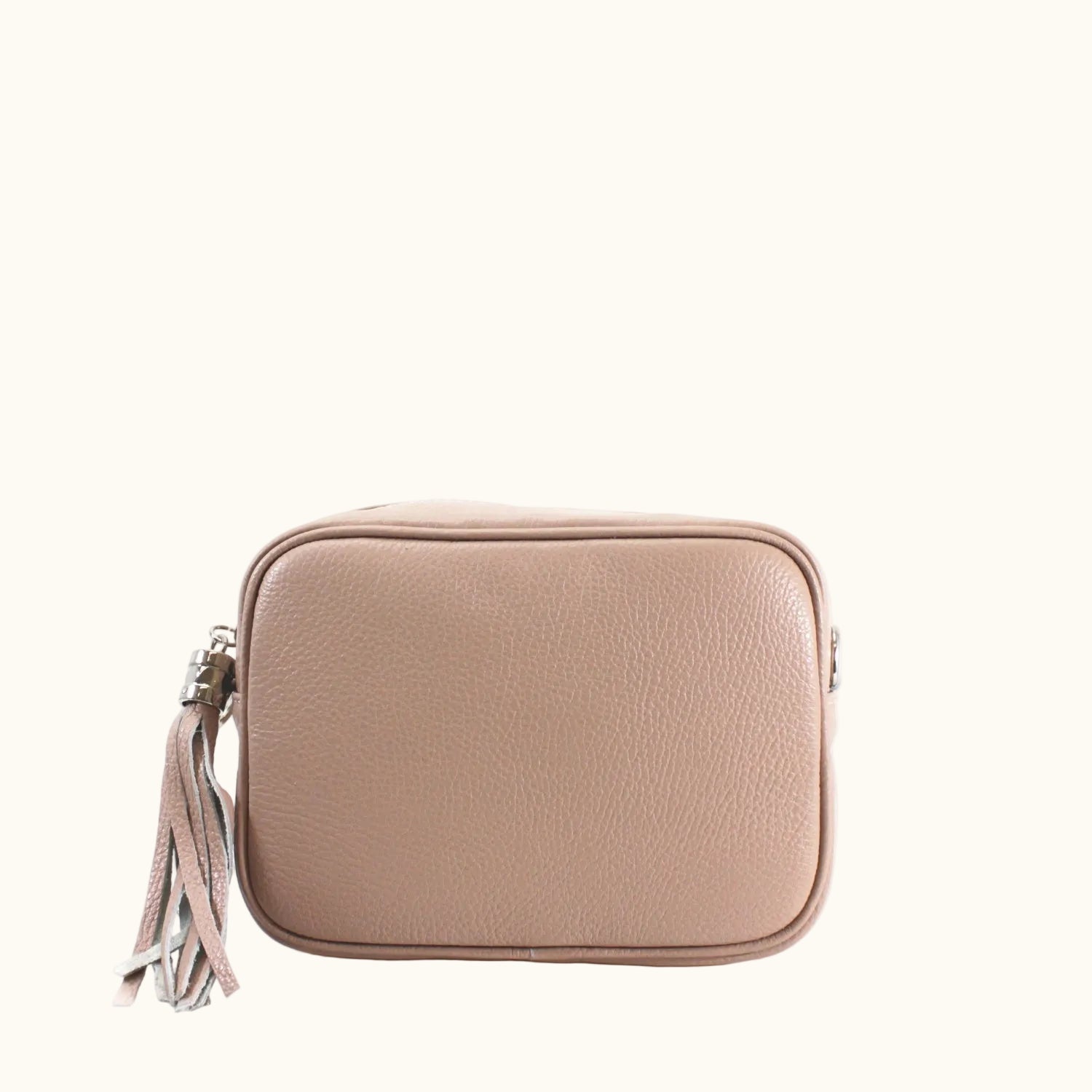 Beige handbag with a tassel on a white background