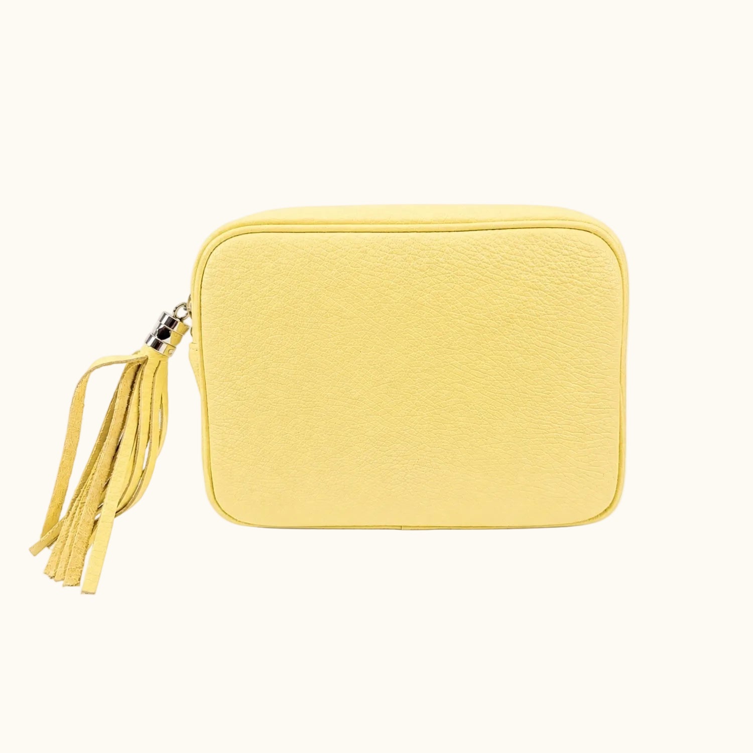 Yellow rectangular pouch with a tassel on a white background
