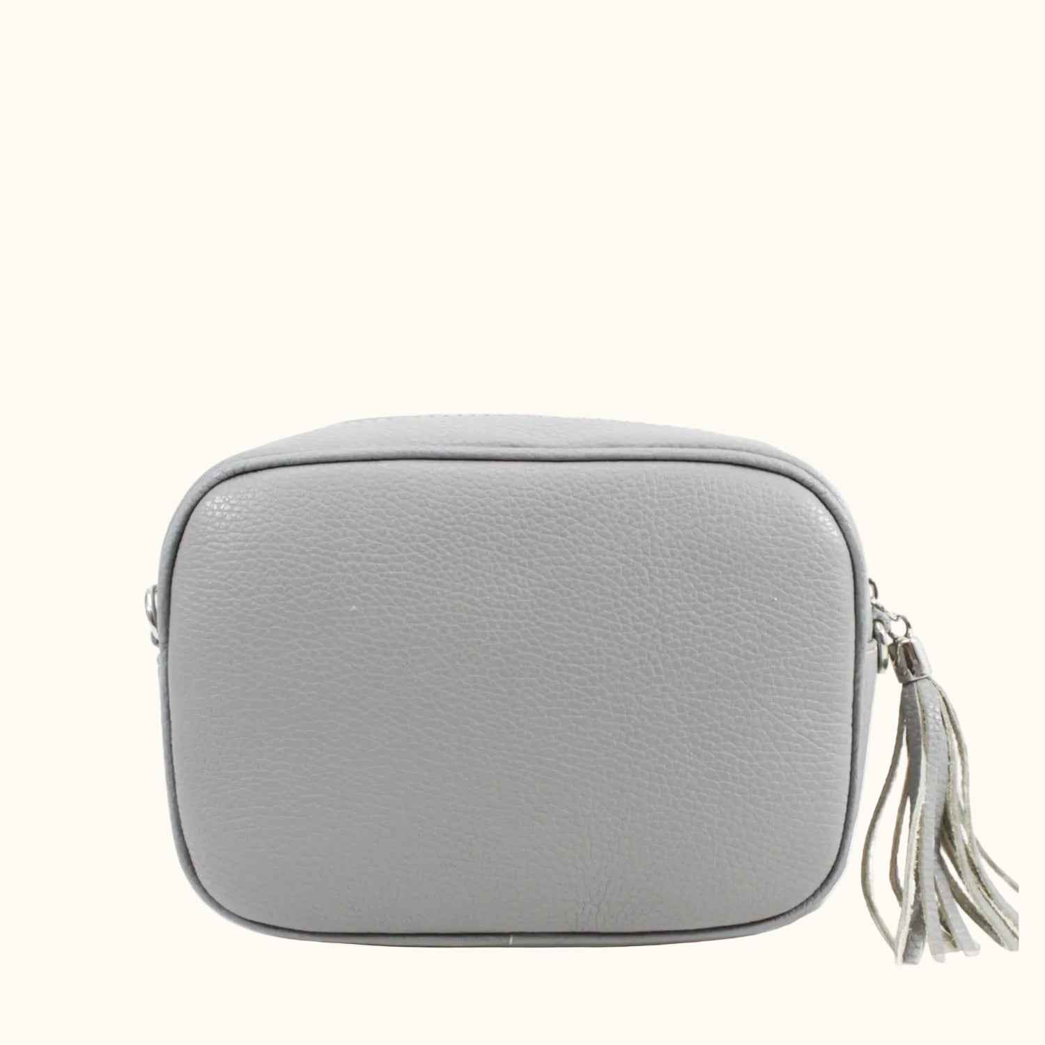 Gray crossbody bag with a tassel on a white background