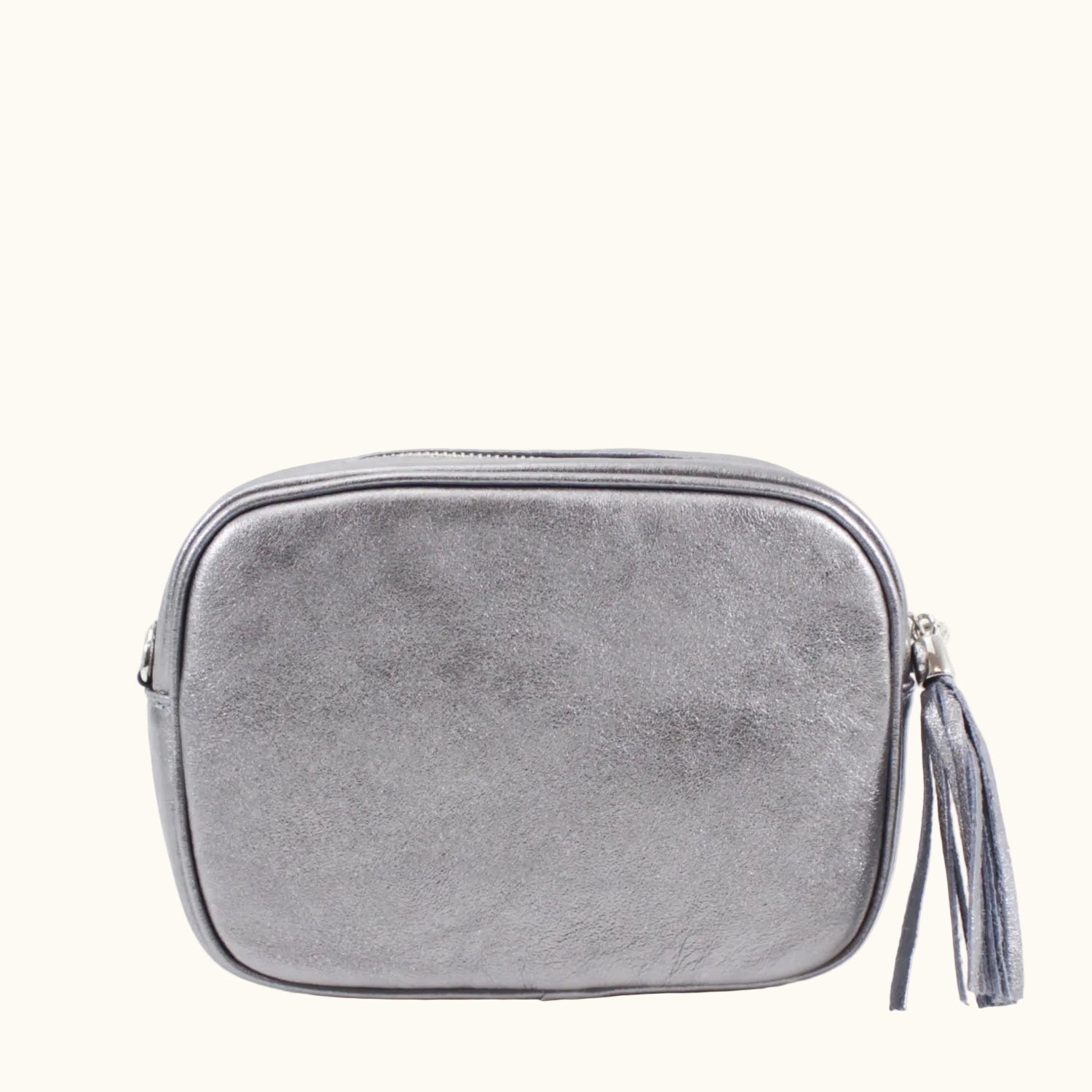 Gray suede pouch with a tassel on a white background