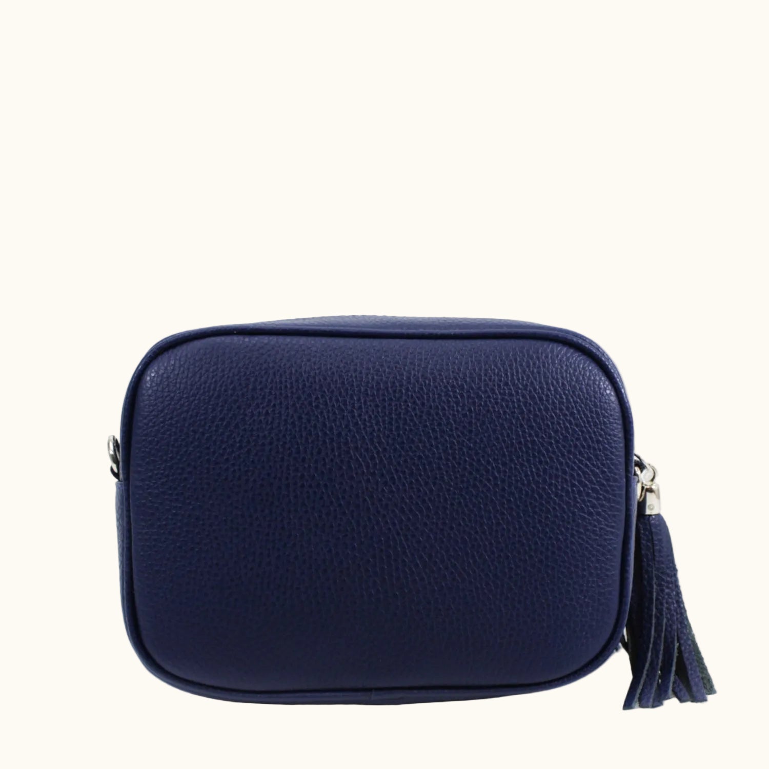 Navy blue crossbody bag with a tassel on a white background