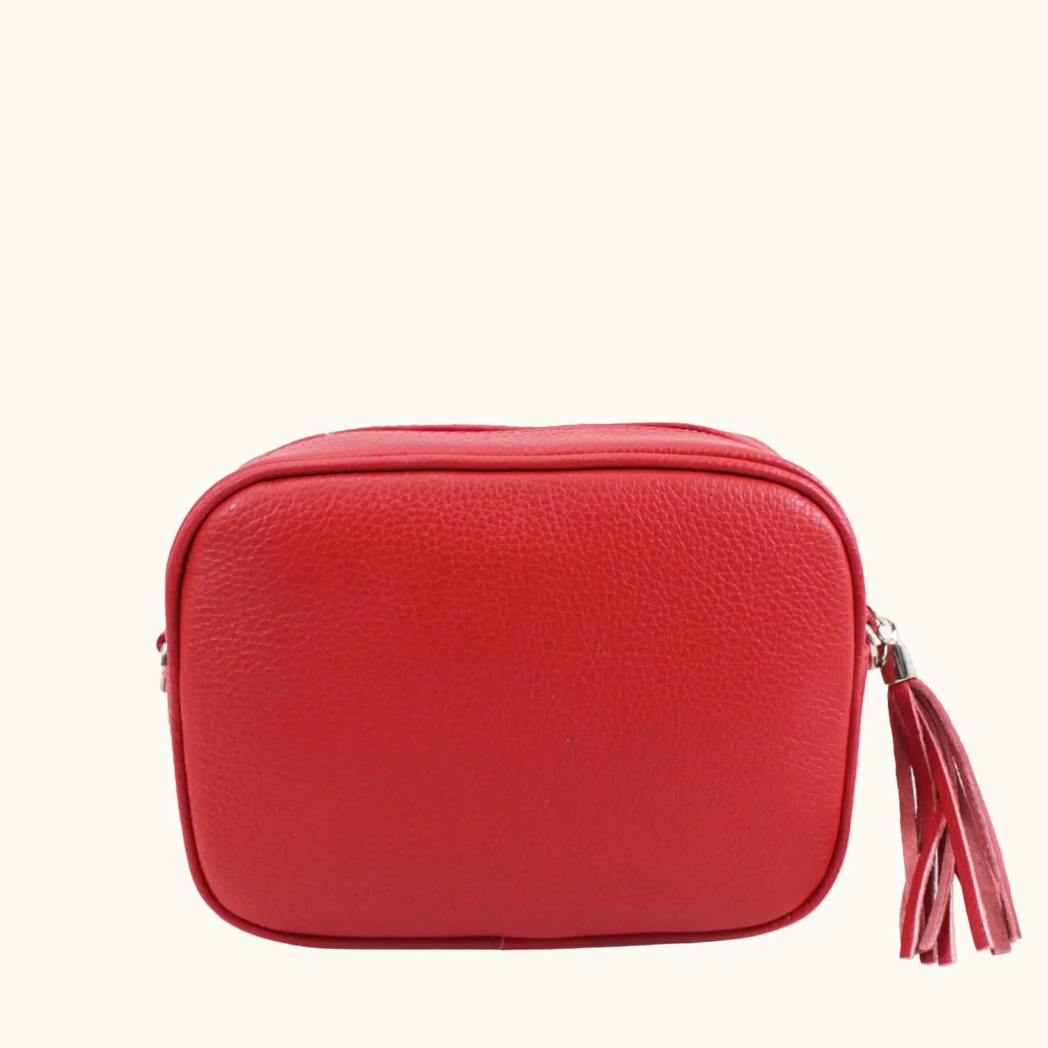 Red leather pouch with a tassel on a white background