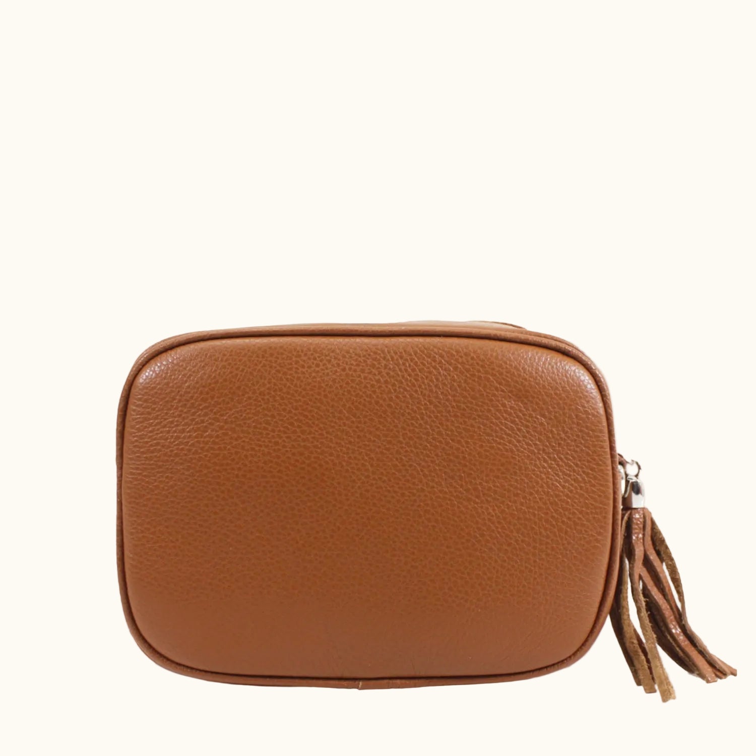 Brown leather pouch with a tassel on a white background