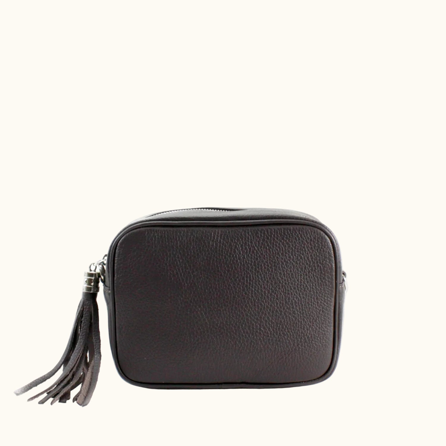 Black leather crossbody bag with a tassel on a white background